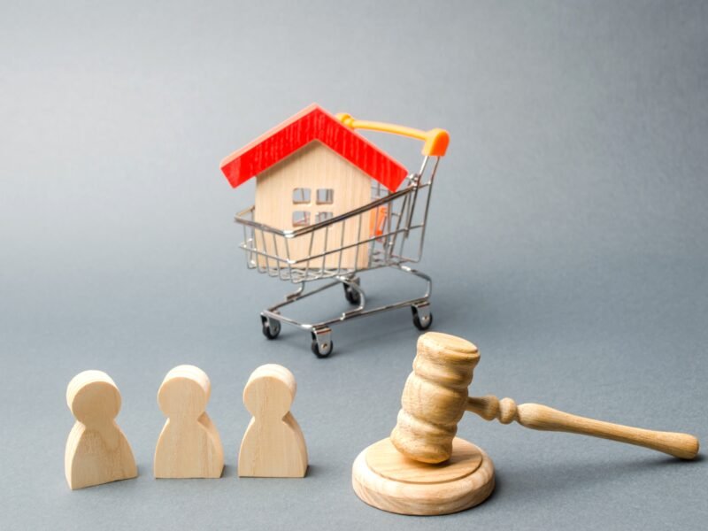 wooden-figures-of-people-a-house-in-a-supermarket-2022-11-09-06-34-01-utc